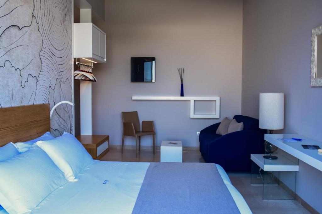 Postel nebo postele na pokoji v ubytování Hotel d'Altavilla