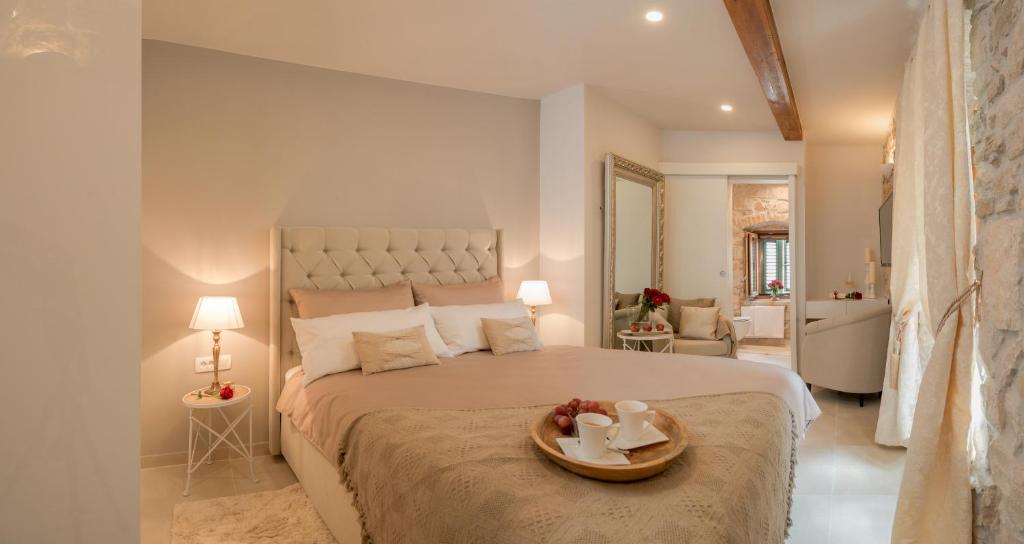Posteľ alebo postele v izbe v ubytovaní Jupiter Lux Rooms