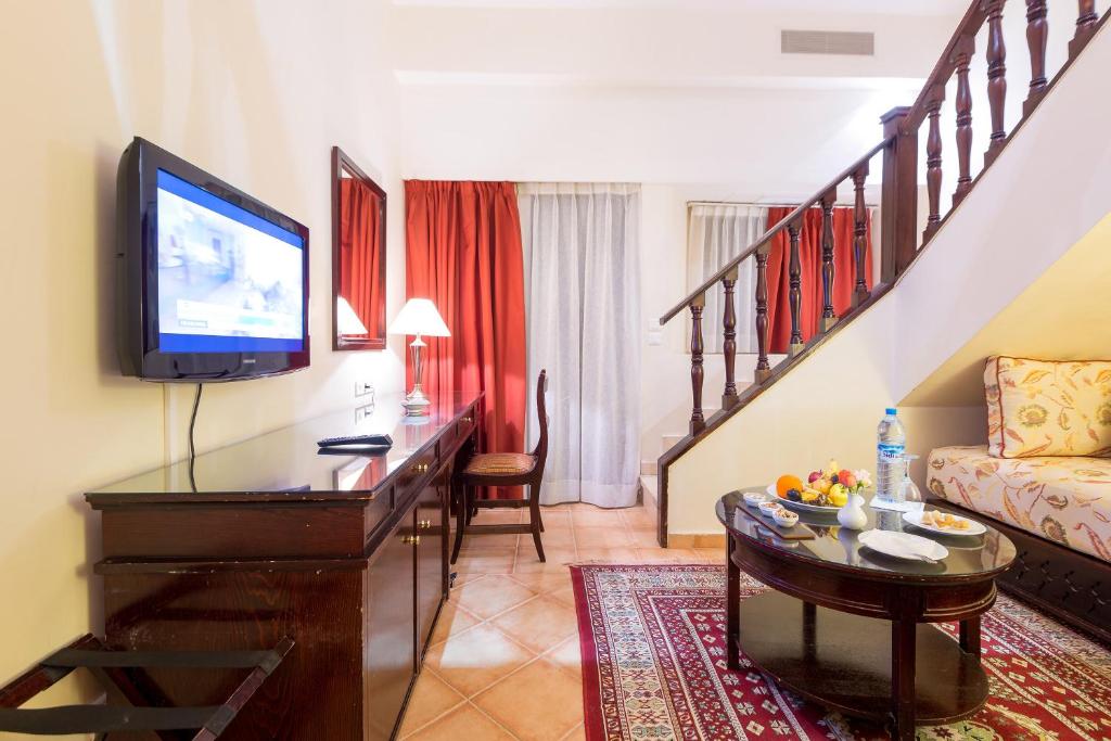 TV a/nebo společenská místnost v ubytování Kennedy Hospitality Resort
