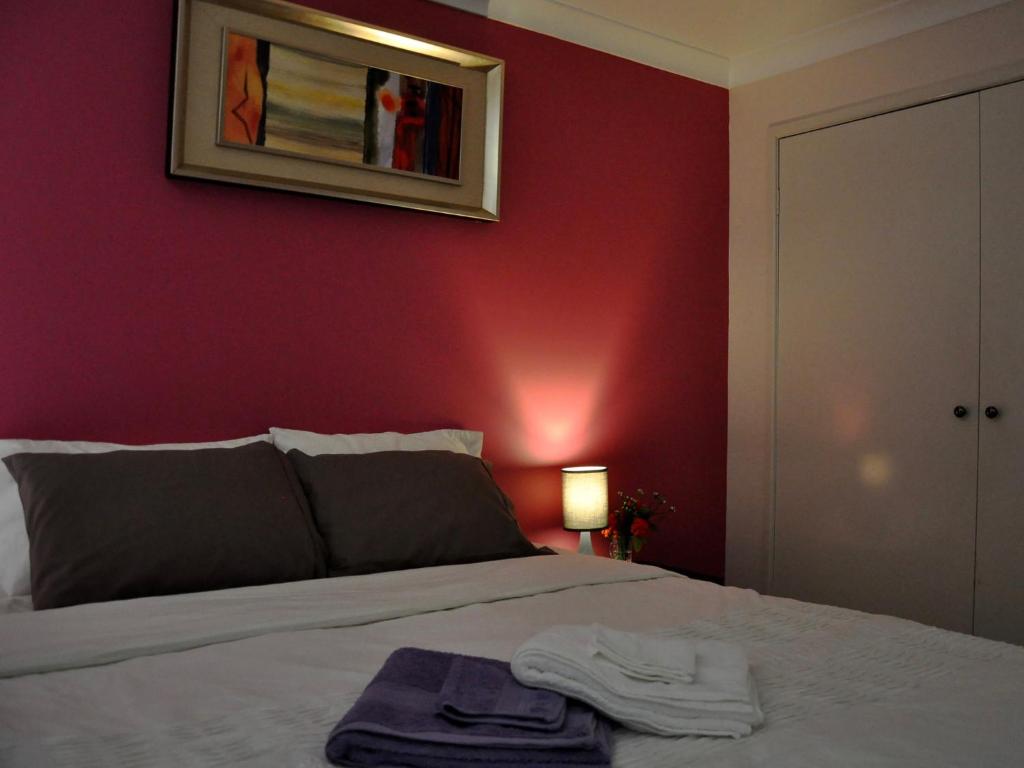 Postel nebo postele na pokoji v ubytování TL Warmest Homestay