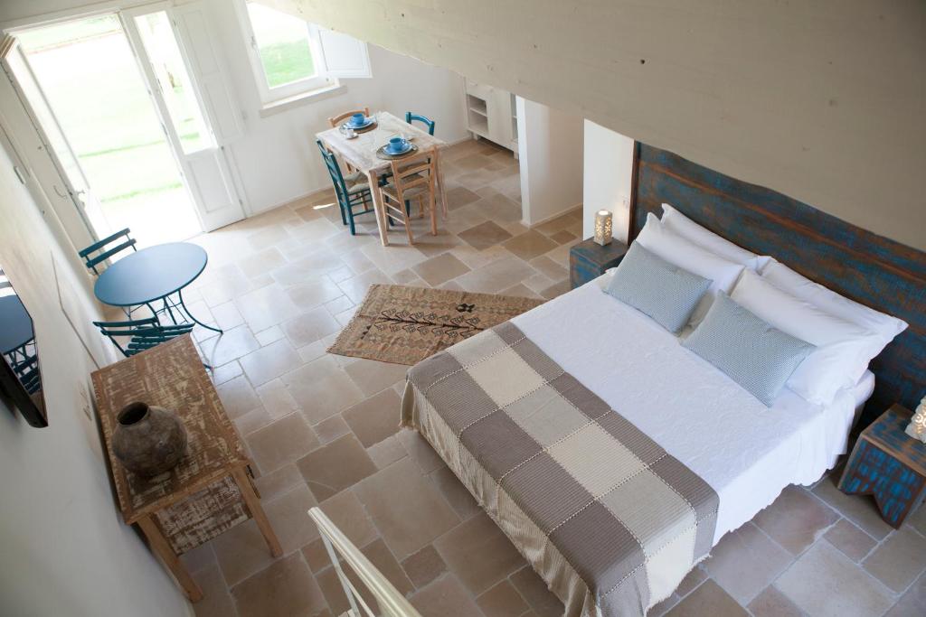 Postel nebo postele na pokoji v ubytování Agrumare Farm Holiday