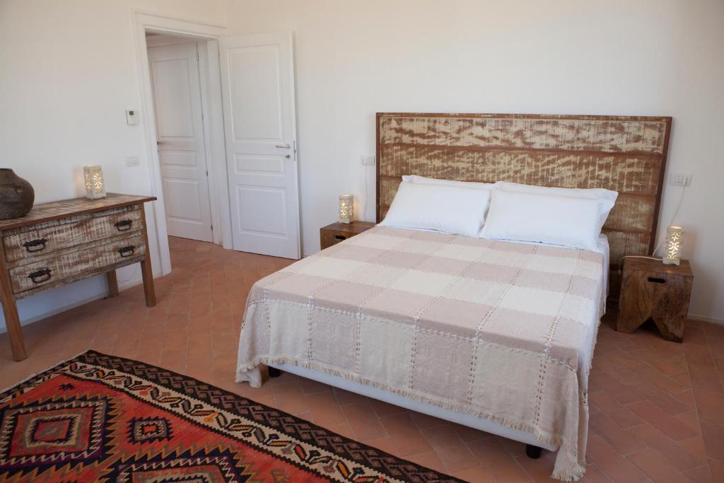 Postel nebo postele na pokoji v ubytování Agrumare Farm Holiday