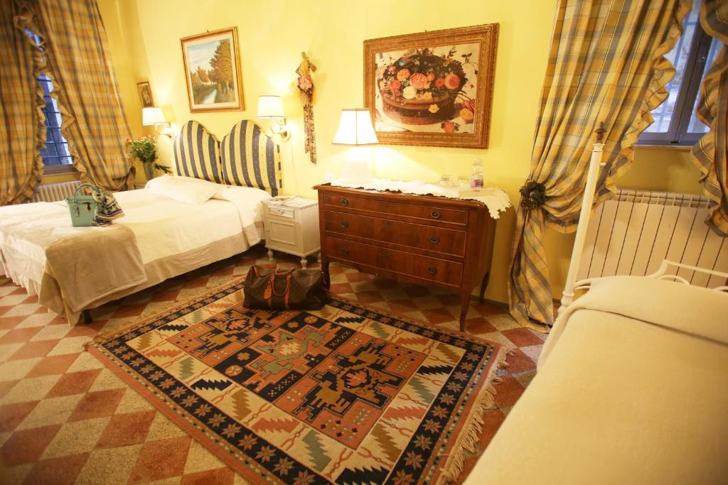 Posteľ alebo postele v izbe v ubytovaní B&B Le Aquile