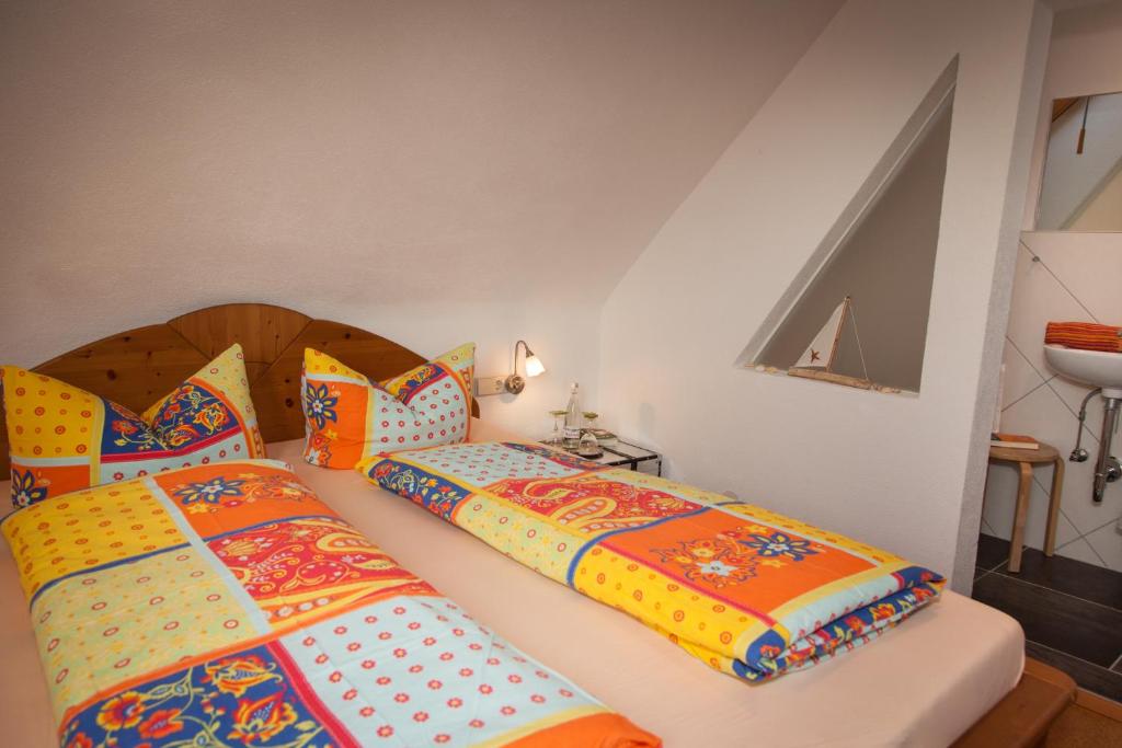 Postel nebo postele na pokoji v ubytování B&B Fischerstüble - adults only