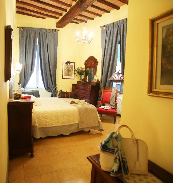 Posteľ alebo postele v izbe v ubytovaní B&B Le Aquile