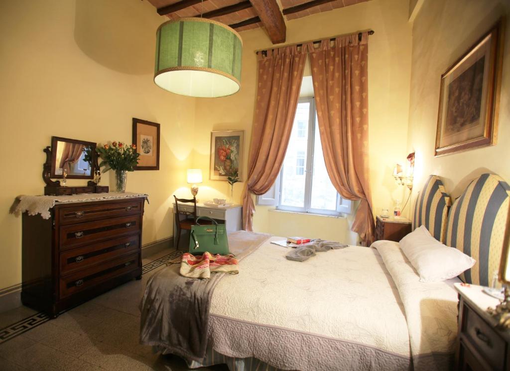 Posteľ alebo postele v izbe v ubytovaní B&B Le Aquile