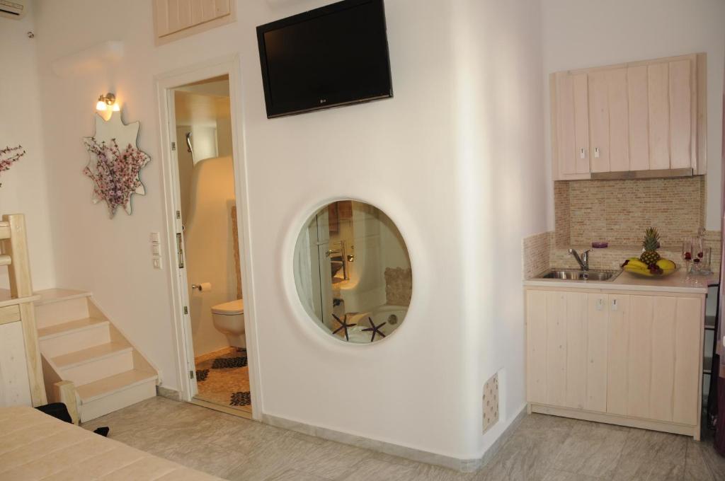 Kuchyňa alebo kuchynka v ubytovaní Starlight Luxury Studios