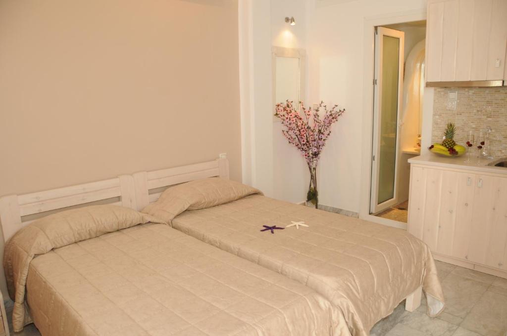 Posteľ alebo postele v izbe v ubytovaní Starlight Luxury Studios