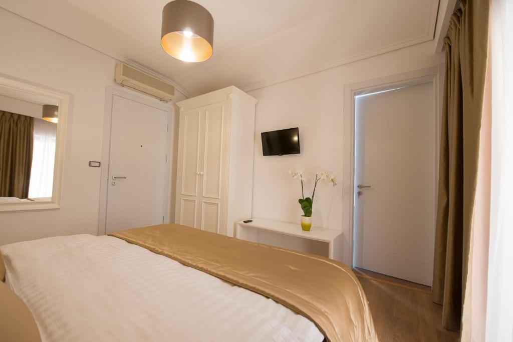 Postel nebo postele na pokoji v ubytování Hotel de Charme