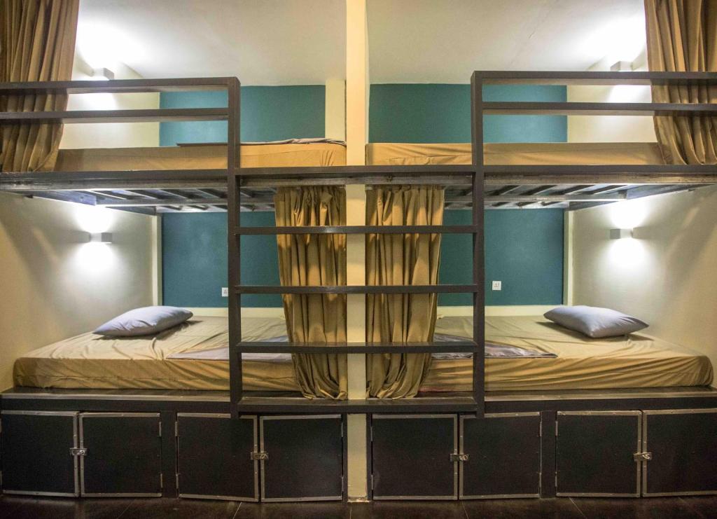 Postel nebo postele na pokoji v ubytování Nest Beach Club
