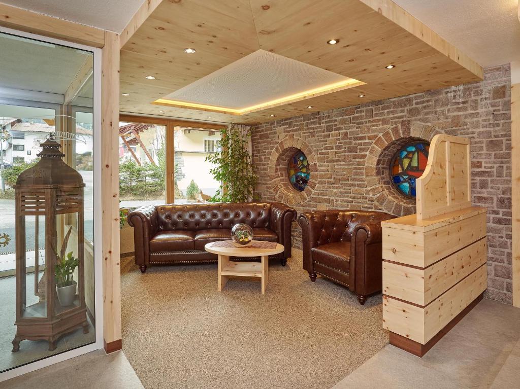 Posezení v ubytování Hotel Gasthof Schöpf