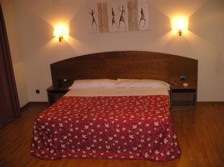 Posteľ alebo postele v izbe v ubytovaní Motel Emporio