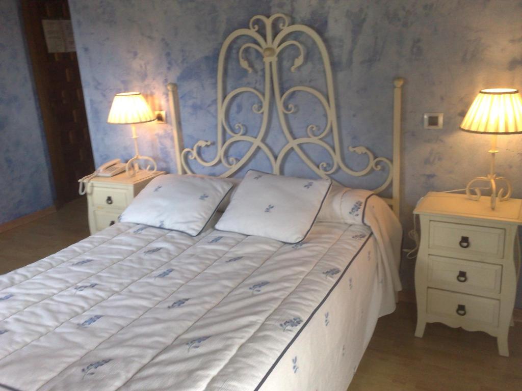 Cama o camas de una habitación en Complejo Rural El Marañal