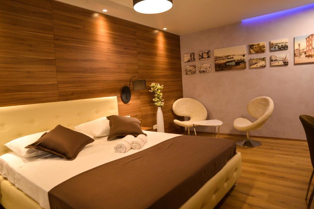 Postel nebo postele na pokoji v ubytování Guest house Crisogono