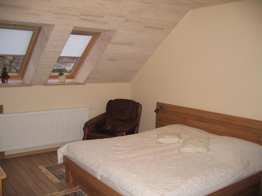 Postel nebo postele na pokoji v ubytování Molo Užeiga Inn