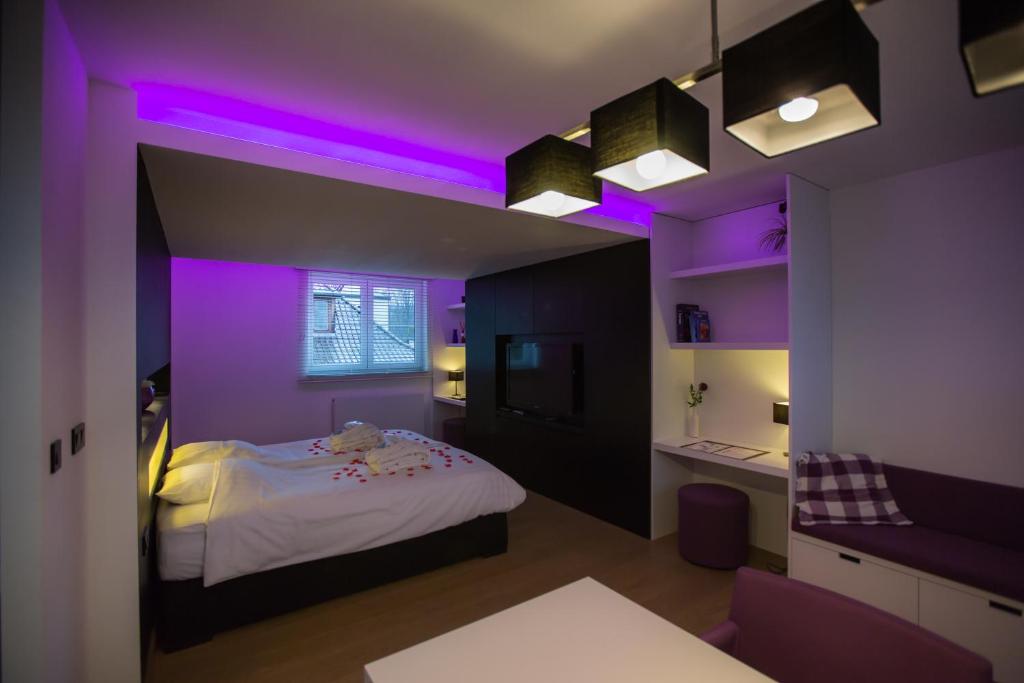 Postel nebo postele na pokoji v ubytování Wellness Hasselt B&B