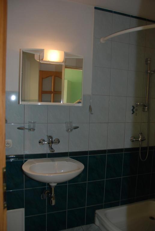 Koupelna v ubytování Penzion Rotunda