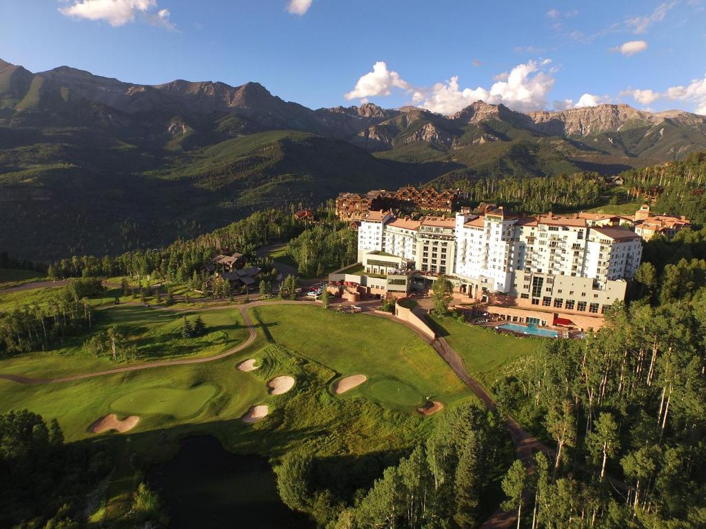 a view of the resort with mountains in the background at The Peaks Resort and Spa in Telluride