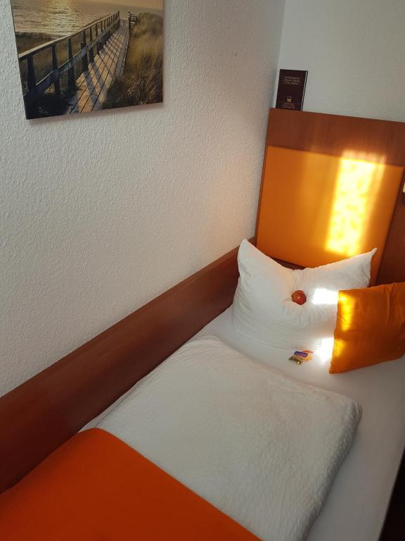 Postel nebo postele na pokoji v ubytování Hotel Amber Altstadt