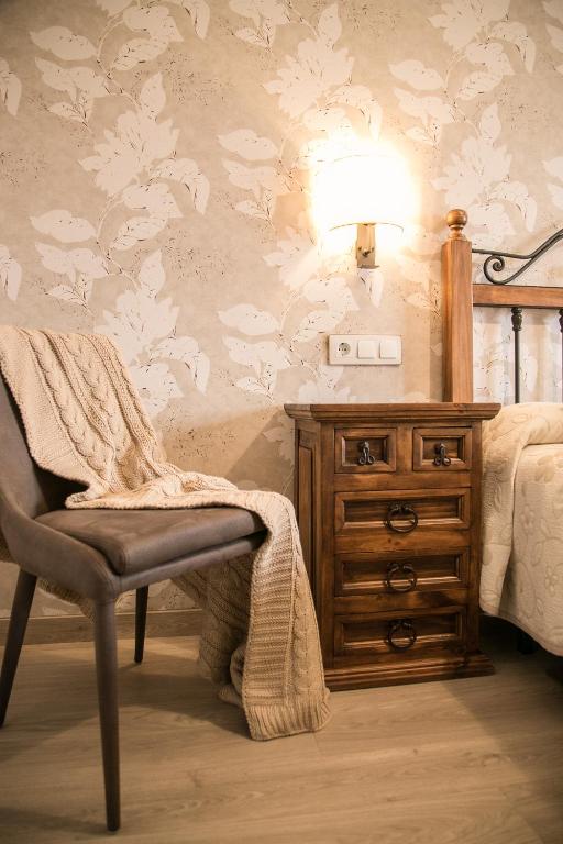 Postel nebo postele na pokoji v ubytování Quintanares