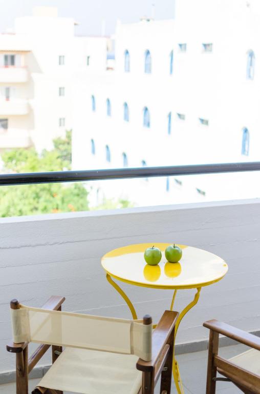 A balcony or terrace at Happiness Apartments