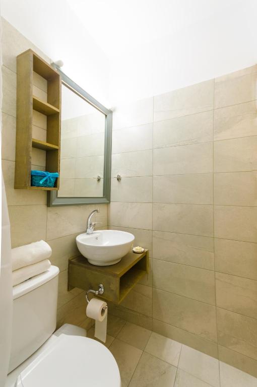 A bathroom at Happiness Apartments