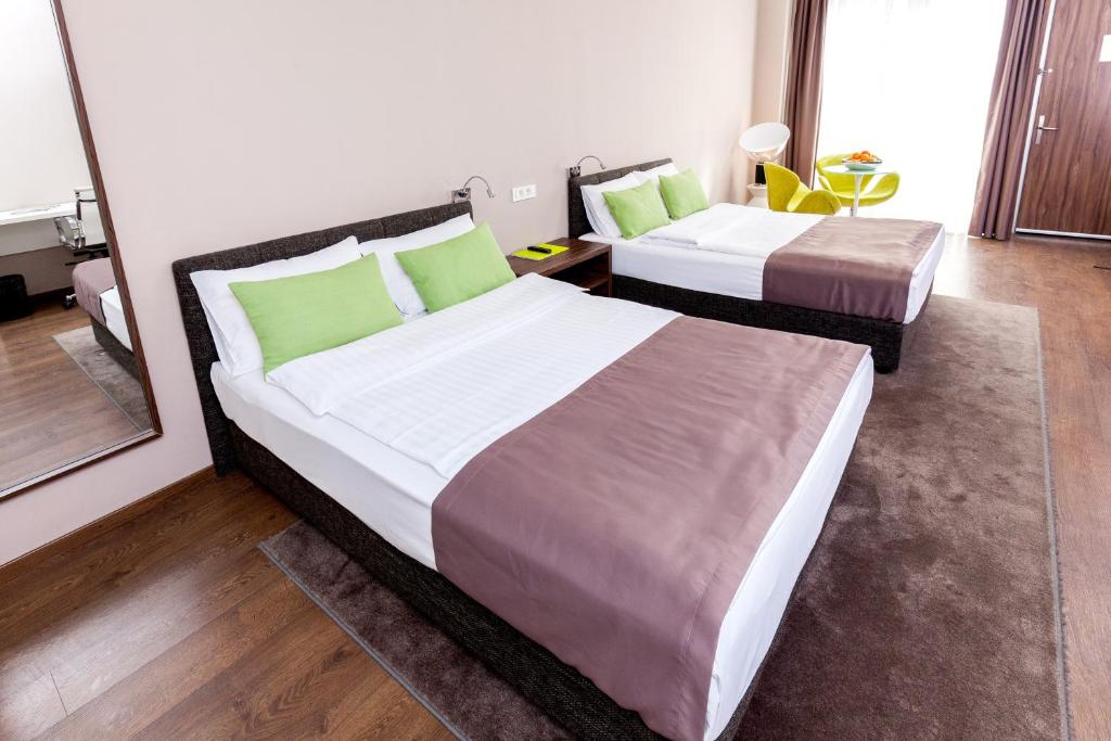 Voodi või voodid majutusasutuse Adresa Suites toas