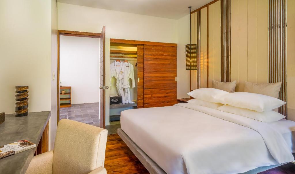 Postel nebo postele na pokoji v ubytování Metta Residence & Spa