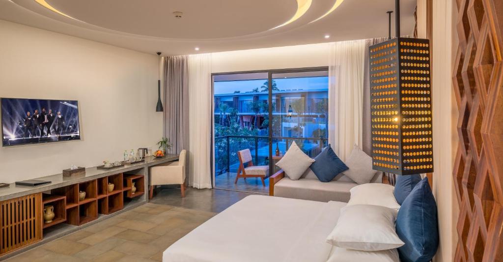 TV a/nebo společenská místnost v ubytování Metta Residence & Spa