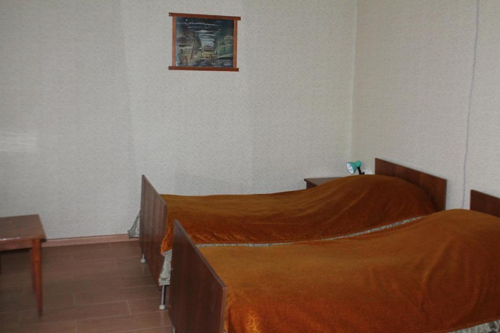 Postel nebo postele na pokoji v ubytování TLT Guest House