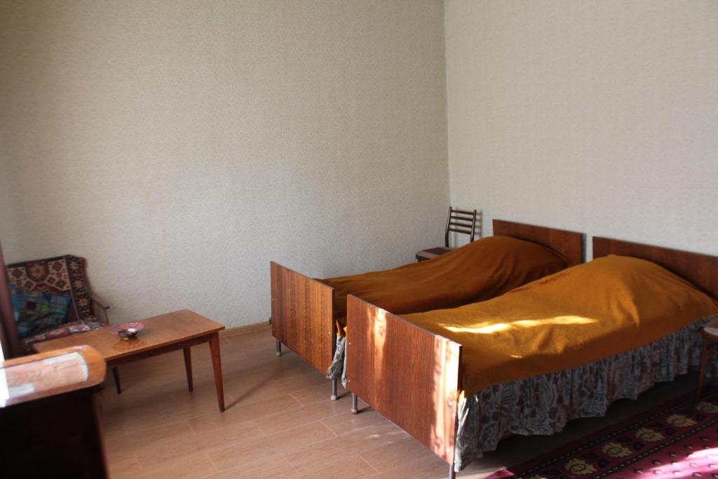 Postel nebo postele na pokoji v ubytování TLT Guest House