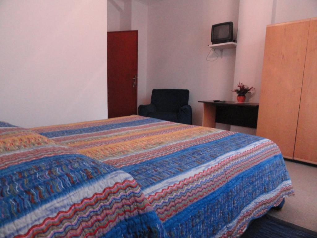 TV a/nebo společenská místnost v ubytování Albergo Ristorante Cima I Pra'