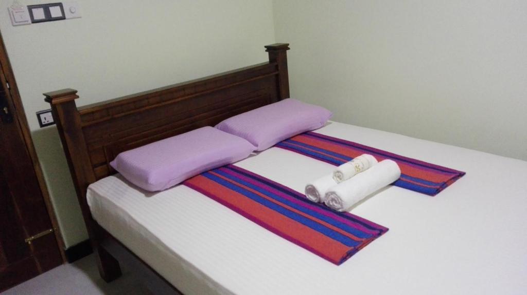 Postel nebo postele na pokoji v ubytování Rajarata Reach Resort