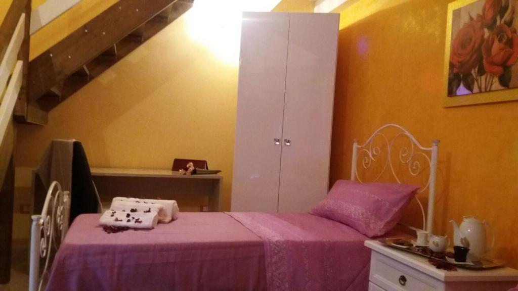 Postel nebo postele na pokoji v ubytování Aia Lucia B&B