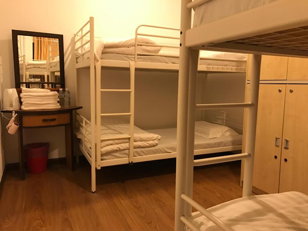 Postel nebo postele na pokoji v ubytování The Barat Perhentian