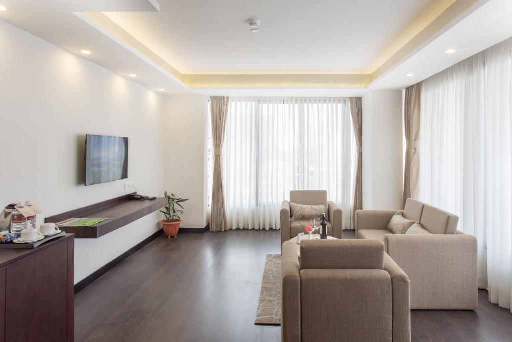 TV a/nebo společenská místnost v ubytování Hotel Mulberry