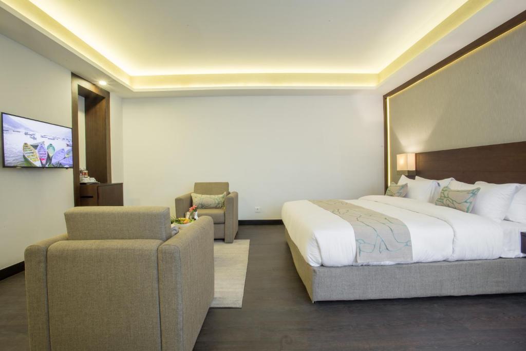 Postel nebo postele na pokoji v ubytování Hotel Mulberry