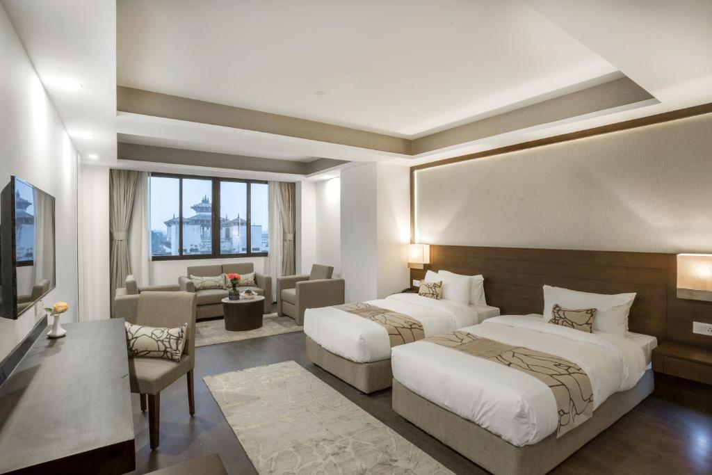 Postel nebo postele na pokoji v ubytování Hotel Mulberry