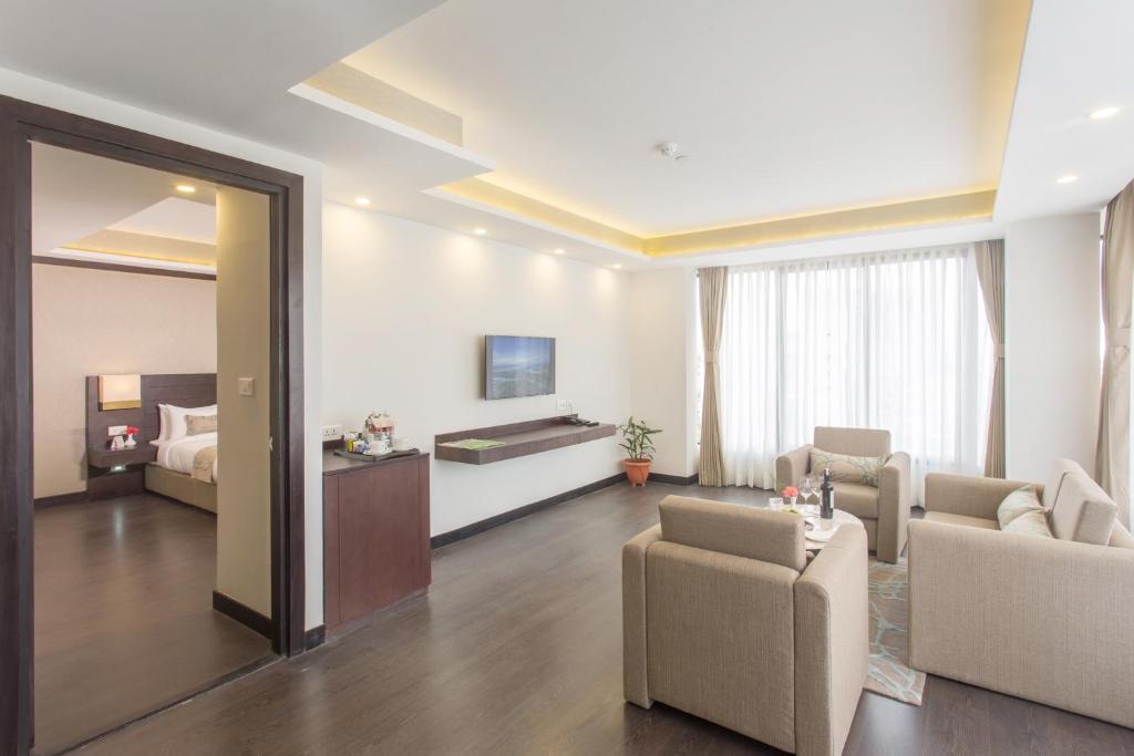 TV a/nebo společenská místnost v ubytování Hotel Mulberry