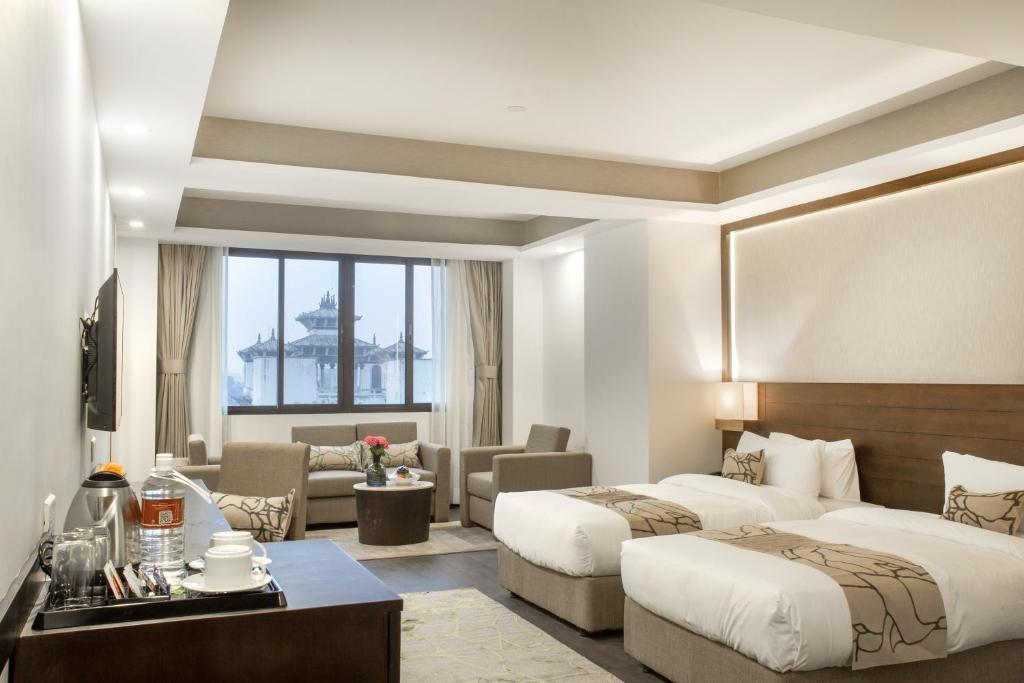 Postel nebo postele na pokoji v ubytování Hotel Mulberry