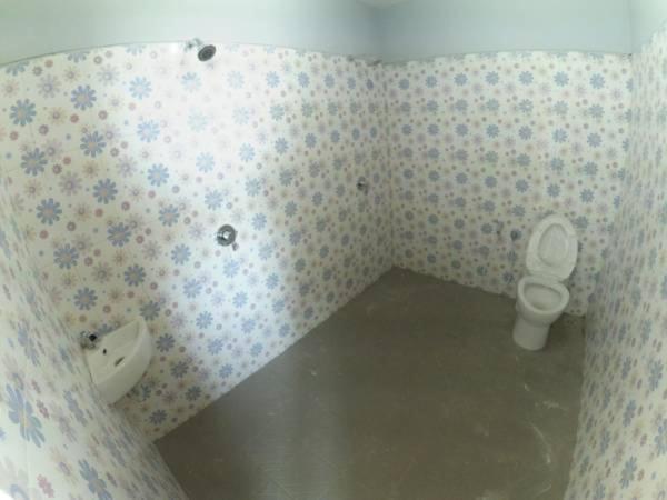 Koupelna v ubytování Mess Inn Semarang