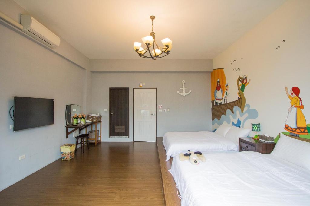Postel nebo postele na pokoji v ubytování Vicking Guesthouse
