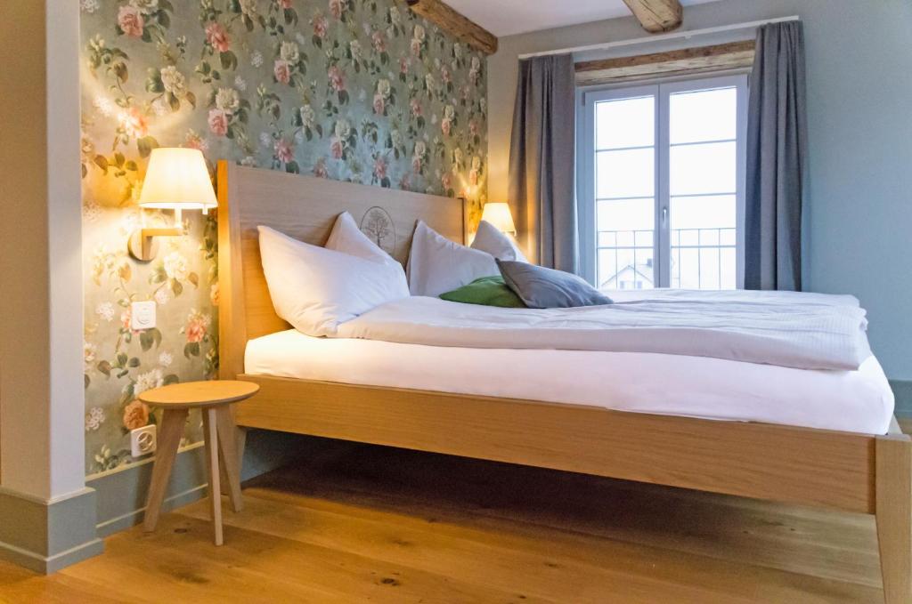 Postel nebo postele na pokoji v ubytování Gasthaus zum Bauernhof
