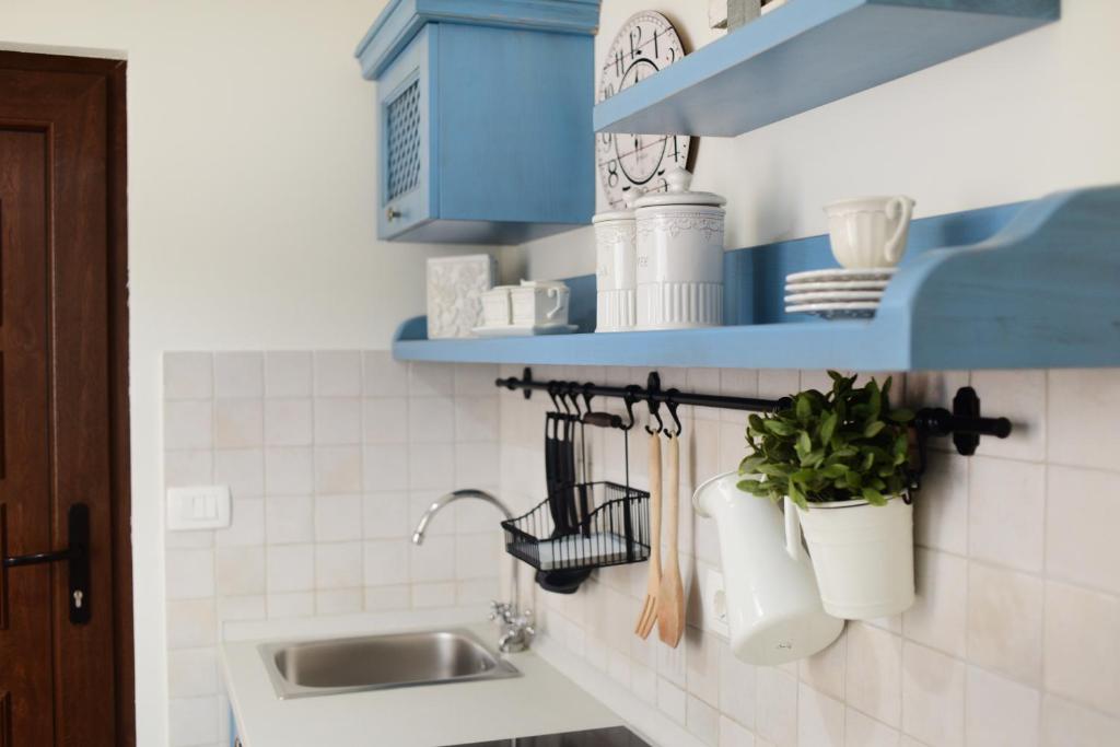 Kuchyň nebo kuchyňský kout v ubytování Apartments ZARA & TONI