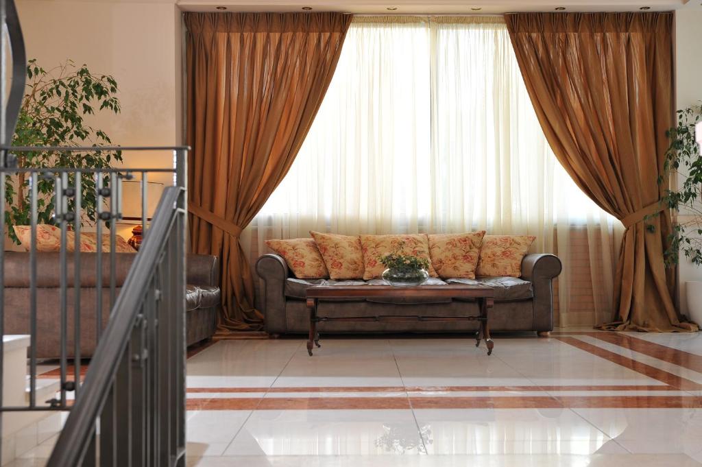 Posezení v ubytování Athens Atrium Hotel & Jacuzzi Suites