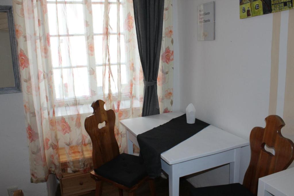 Postel nebo postele na pokoji v ubytování U Parku