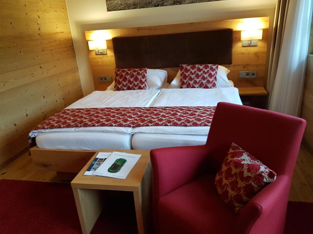 Postel nebo postele na pokoji v ubytování Gästehaus der Geroldsauer Mühle
