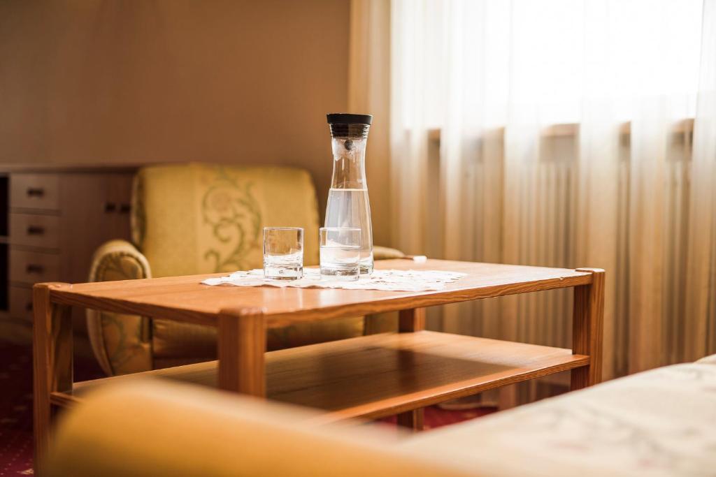 Postel nebo postele na pokoji v ubytování Hotel Theresia