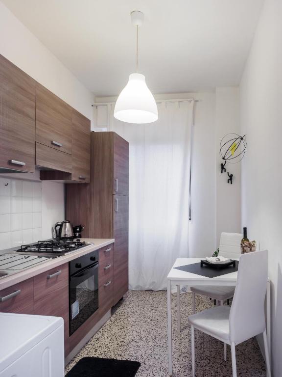 Kuchyňa alebo kuchynka v ubytovaní Enjoy Apartment Gorla