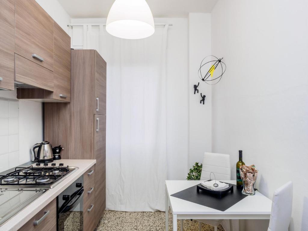 Kuchyňa alebo kuchynka v ubytovaní Enjoy Apartment Gorla